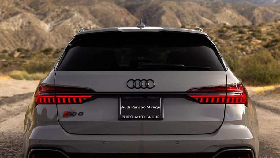 Front profile view of an Audi Q7 accelerating.